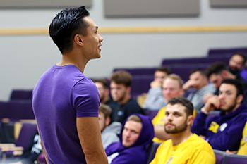 Hoan Do speaks to students