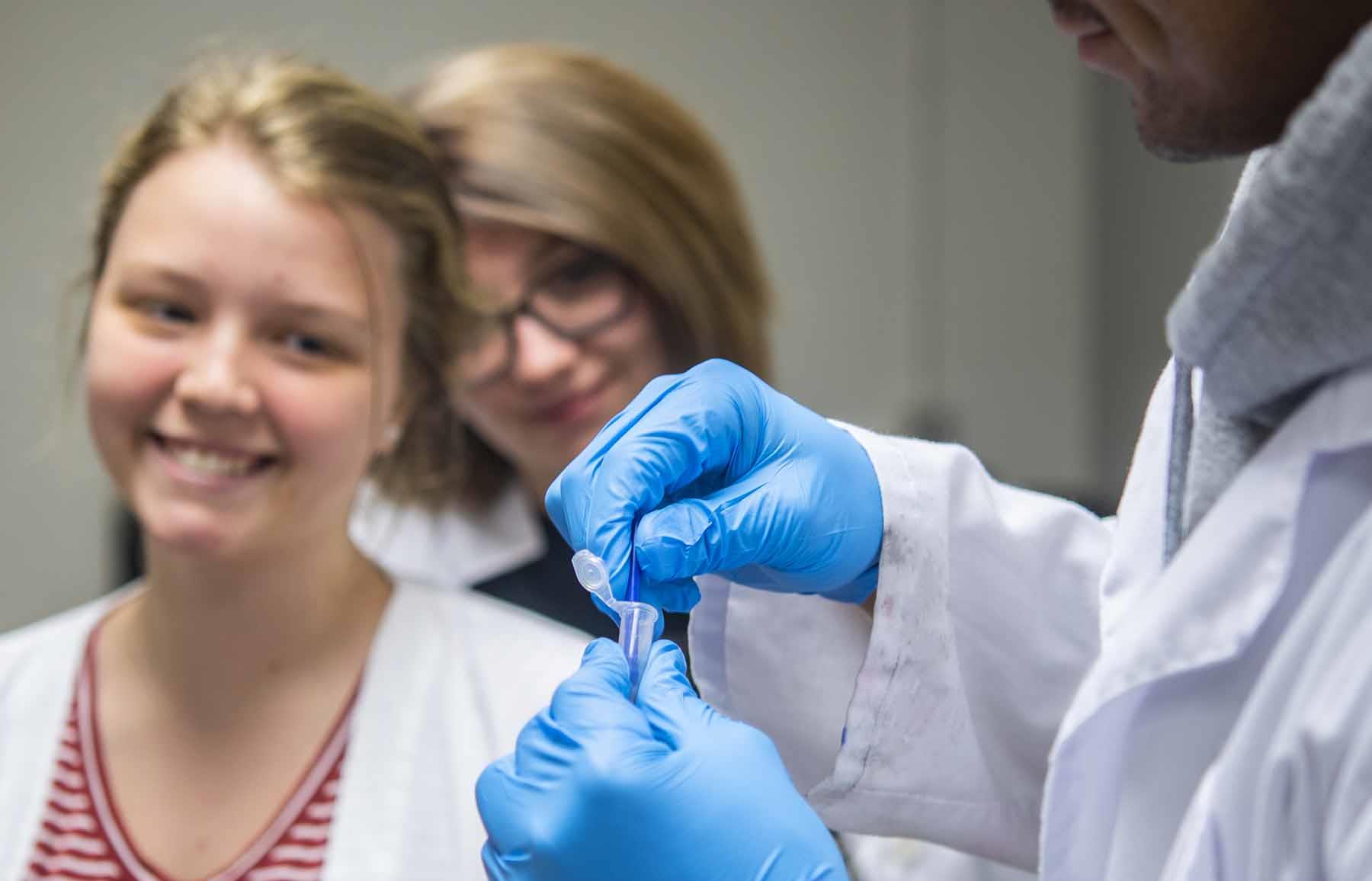 image of a student working with a molecular sample